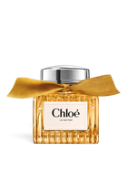 euaden Chloe Le Nectar Parfum Intense, altın sarısı cam şişesi ve zarif kurdele detayıyla lüks kadın parfümü.