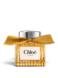 euaden Chloe Le Nectar Parfum Intense, altın sarısı cam şişesi ve zarif kurdele detayıyla lüks kadın parfümü.