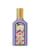 euaden Gucci Flora Gorgeous Magnolia 100 ml kadın parfümü, lila renkli şişesi ve ikonik çiçek desenli etiketiyle