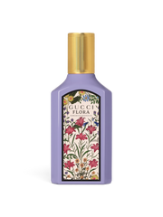 euaden Gucci Flora Gorgeous Magnolia 100 ml kadın parfümü, lila renkli şişesi ve ikonik çiçek desenli etiketiyle