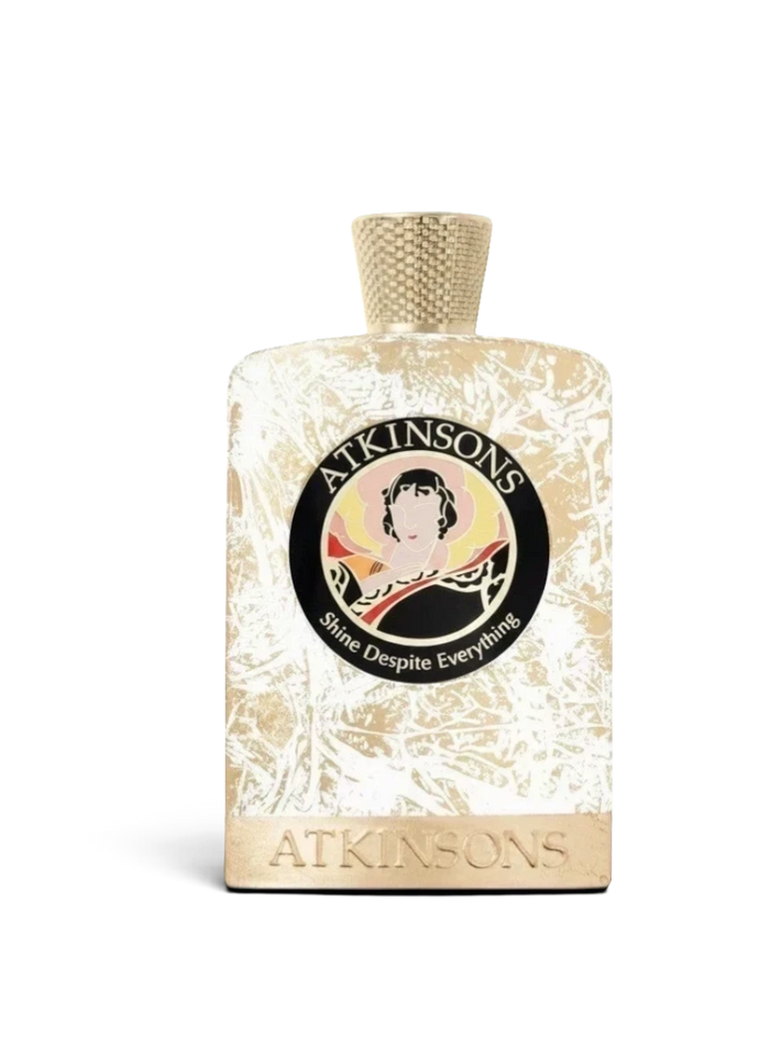 euaden Atkinsons Shine Despite Everything unisex parfüm, altın rengi dokulu şişe tasarımı ve zarif marka logosu ile.