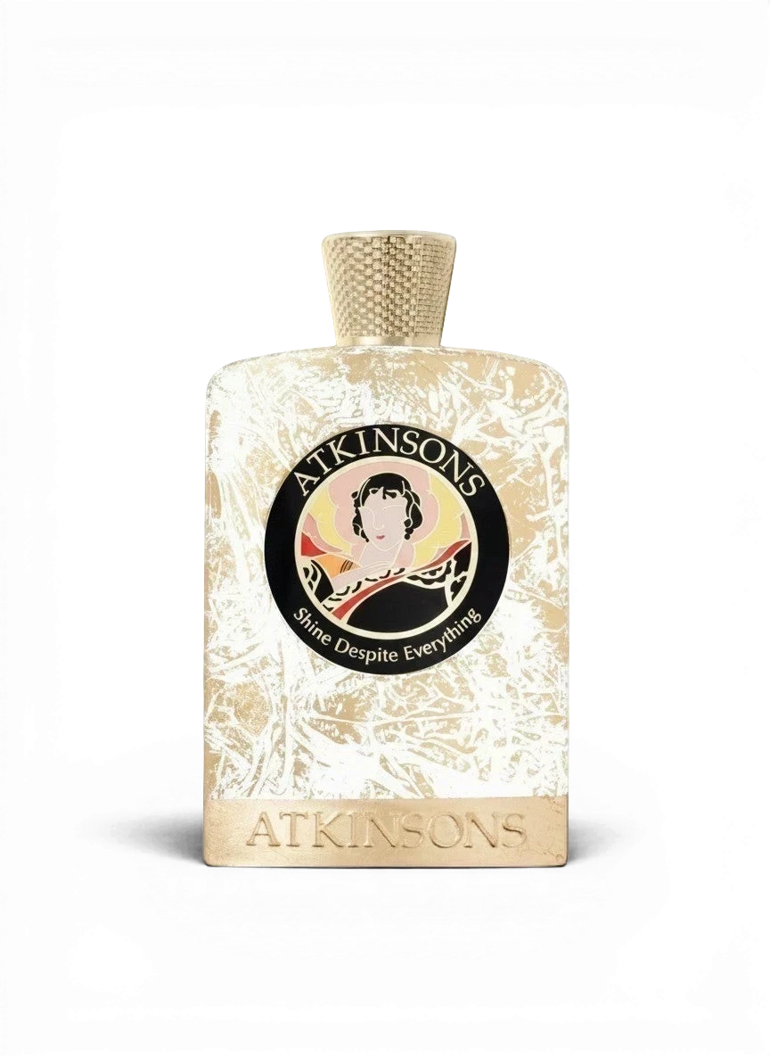 euaden Atkinsons Shine Despite Everything unisex parfüm, altın rengi dokulu şişe tasarımı ve zarif logo detayı