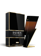 euaden satışı olan, siyah ve altın detaylı şimşek formunda Carolina Herrera Bad Boy Elixir erkek parfüm şişesi ve kutusu