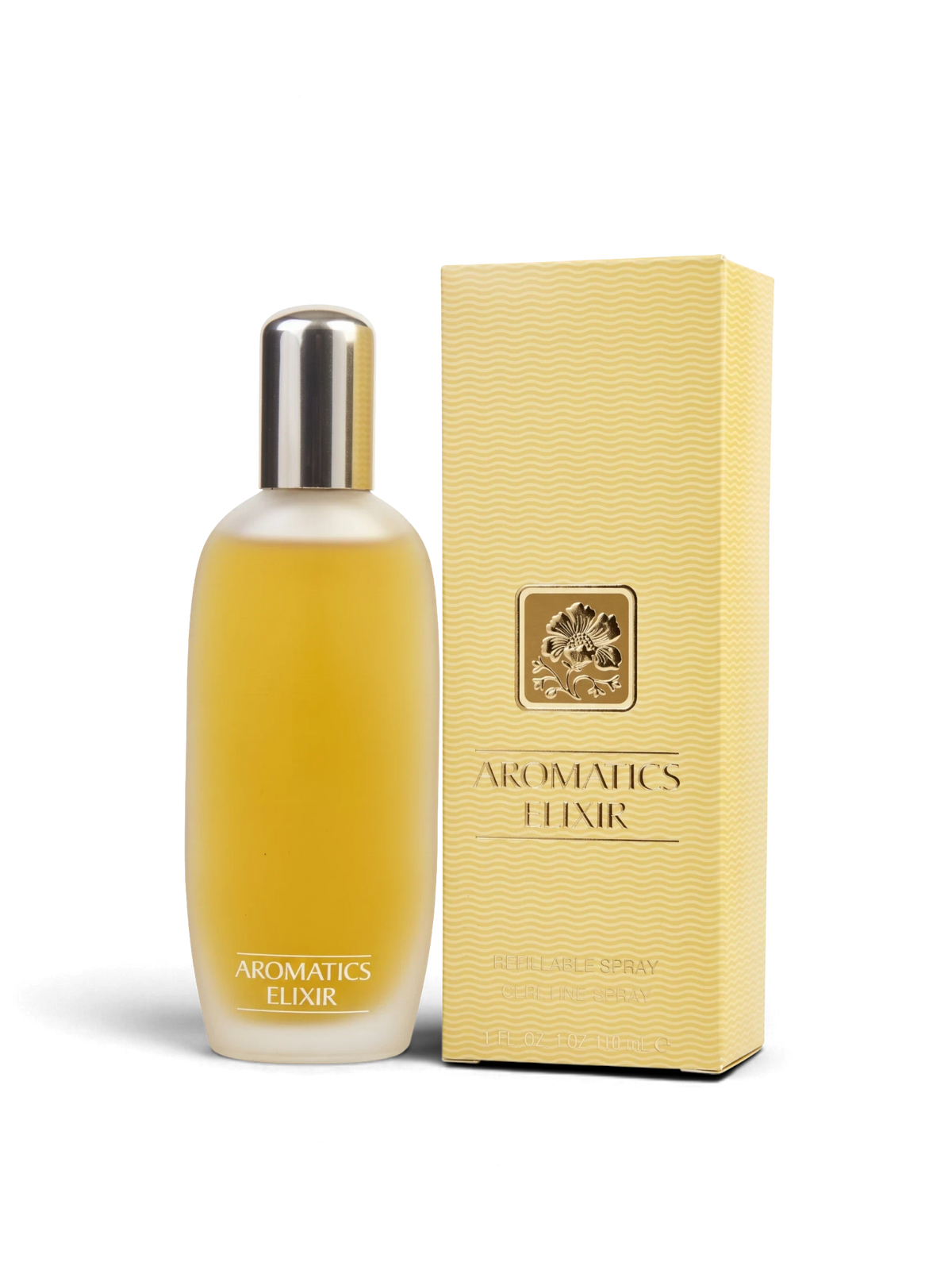 euaden Clinique Aromatics Elixir 100 ml kadın parfümü, şık buzlu cam şişesi ve altın sarısı kutusuyla