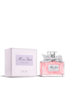 euaden DIOR Miss Dior kadın parfümü, pembe cam şişesi ve ikonik gümüş fiyonk detayı ile kutusuyla birlikte.
