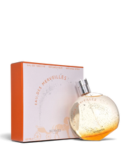 euaden HERMÈS Eau des Merveilles 100 ml EDT parfüm, üzerinde yıldız desenleri olan ikonik yuvarlak cam şişesi ve kutusu