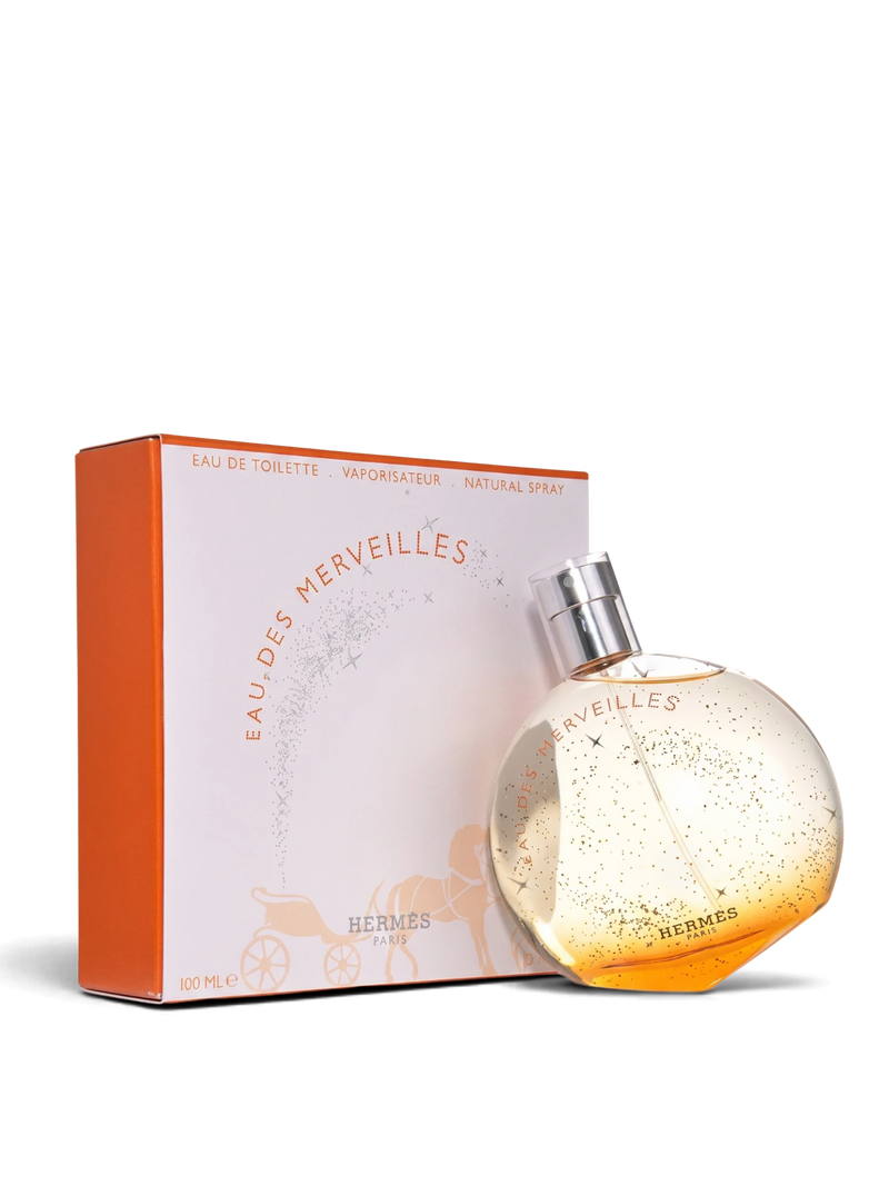 euaden HERMÈS Eau des Merveilles 100 ml EDT parfüm, üzerinde yıldız desenleri olan ikonik yuvarlak cam şişesi ve kutusu