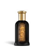euaden Hugo Boss Boss Bottled Elixir erkek parfümü, altın kapaklı koyu cam şişe tasarımıyla lüks ve yoğun koku.