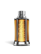 euaden HUGO BOSS Boss The Scent erkek parfümü, kehribar rengi cam şişesi ve metalik kafes tasarımıyla