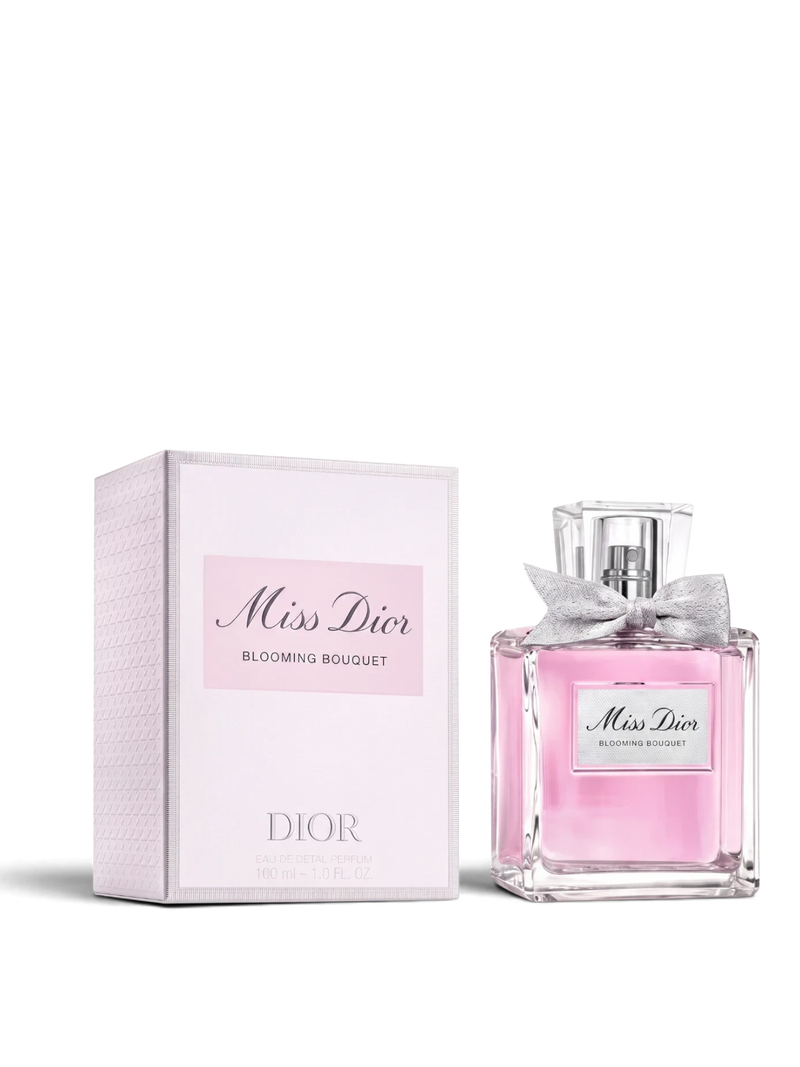 euaden Miss Dior Blooming Bouquet 100 ml kadın parfümü, pembe çiçeksi kokusu ve zarif fiyonklu cam şişesiyle.