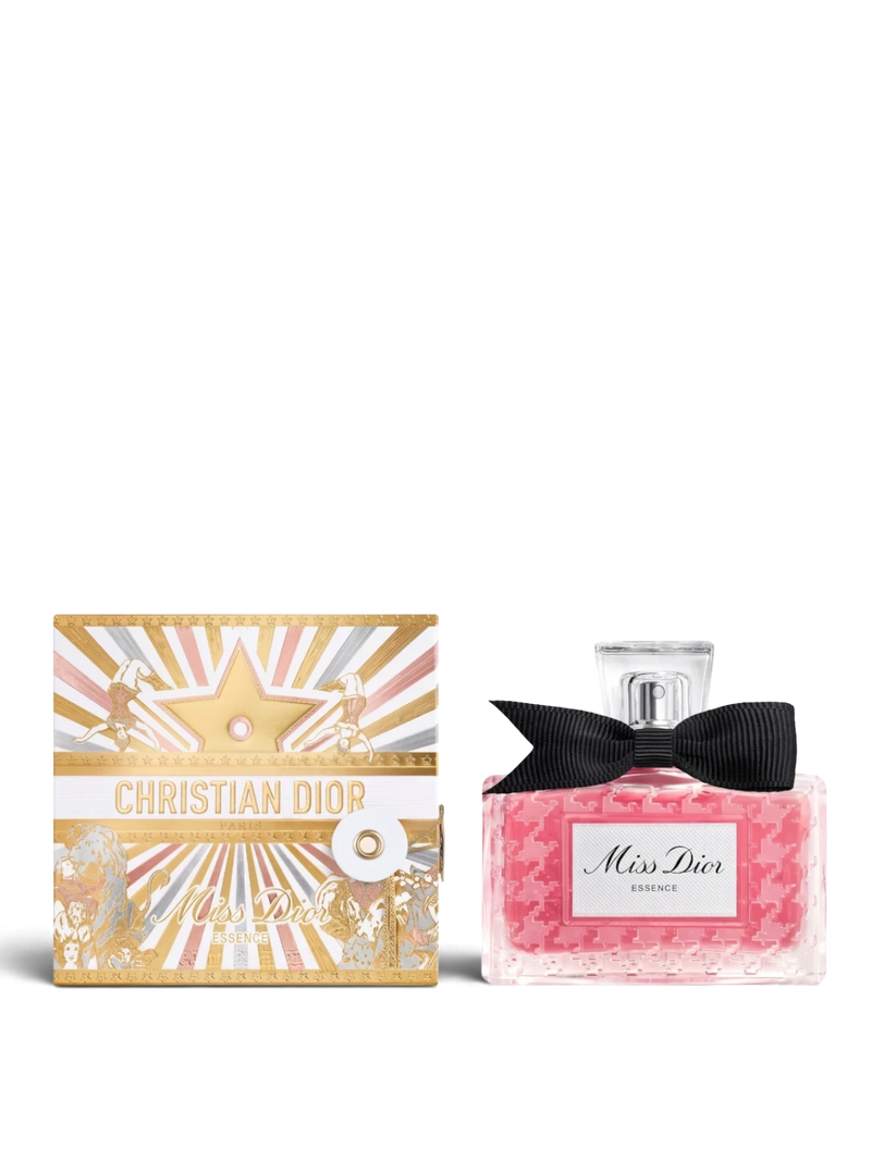 euaden Miss Dior Essence kadın parfümü, pembe cam şişesi, siyah fiyonk detayı ve özel tasarım kutusu ile birlikte.
