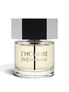 euaden Yves Saint Laurent L'Homme erkek parfümü, şeffaf cam şişesi ve ikonik altıgen metal kapağı ile